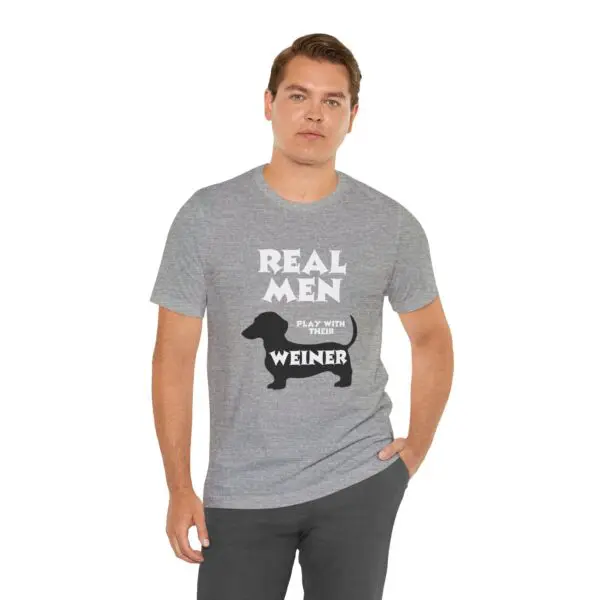 Man wearing "Real Men" dachshund T-shirt.