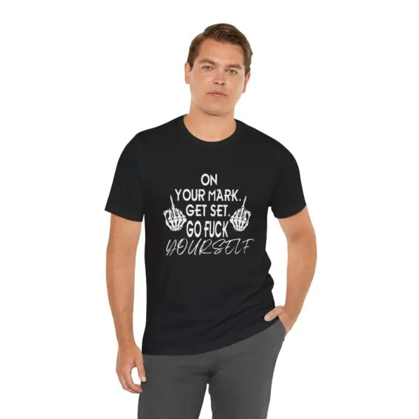 Man wearing a black graphic t-shirt.