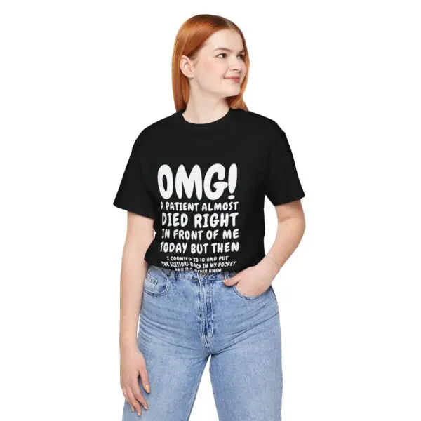 Woman wearing humorous medical-themed t-shirt.