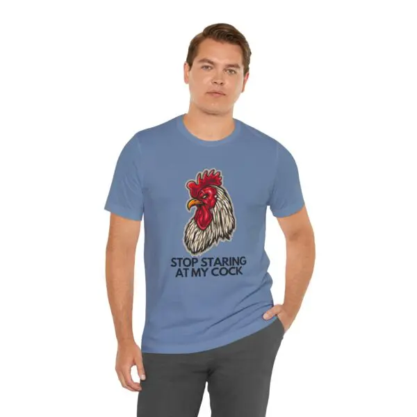 Man wearing rooster graphic T-shirt, humorous text.
