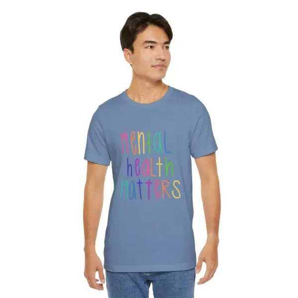 Man wearing "Mental Health Matters" shirt.