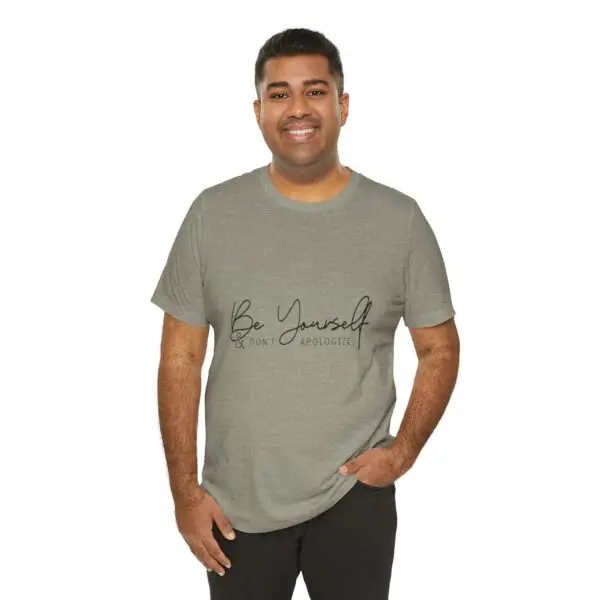 Man wearing "Be Yourself" printed t-shirt.