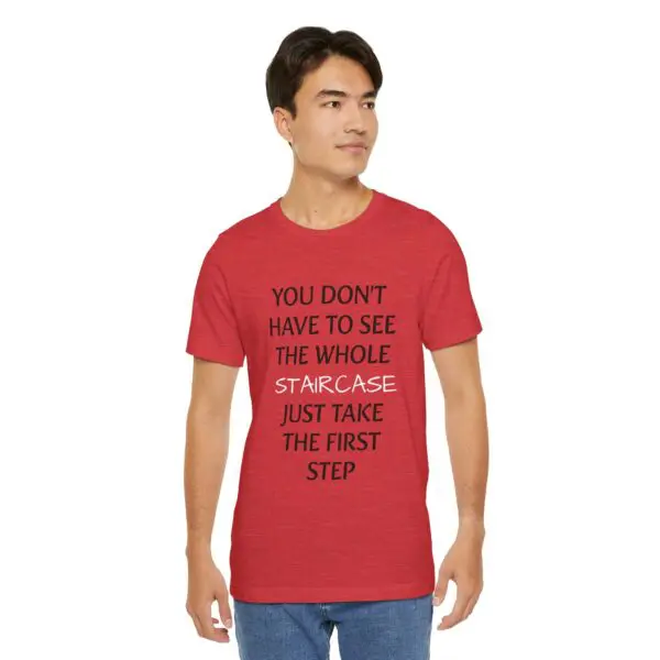 Man wearing a motivational quote t-shirt.