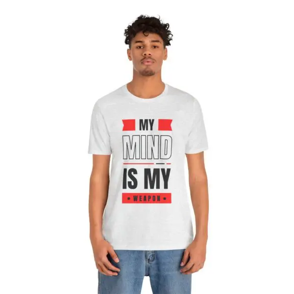 Man wearing "My Mind is My Weapon" shirt.