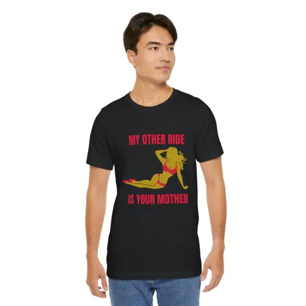 Man wearing a black graphic T-shirt.