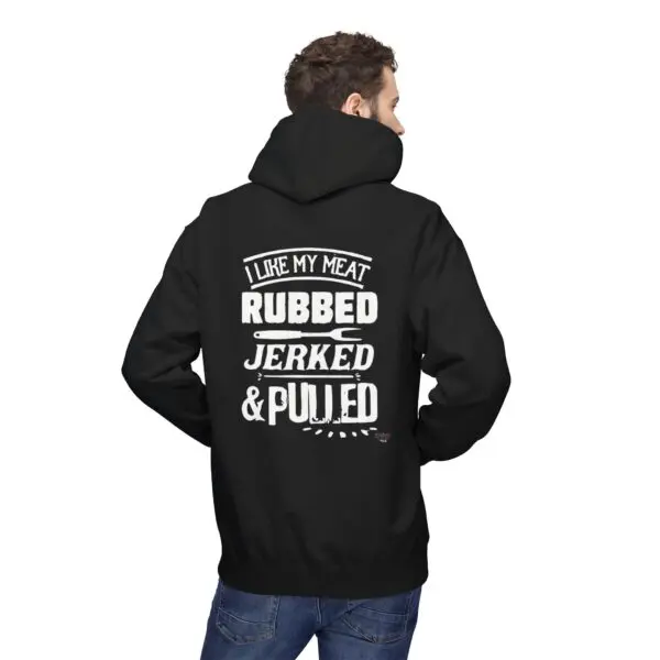 Man wearing hoodie with humorous meat text.