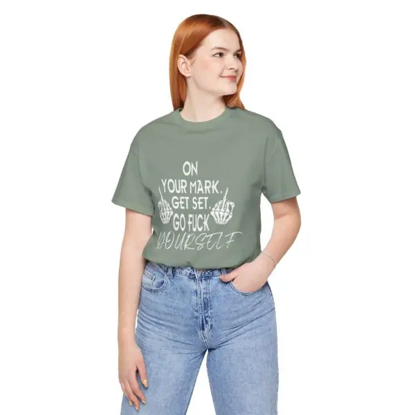 Woman in graphic tee with message.