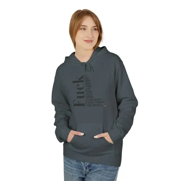 Woman in hoodie with printed text.