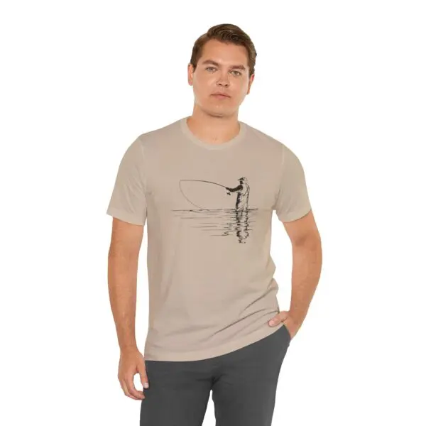 Man wearing beige fishing-themed t-shirt.