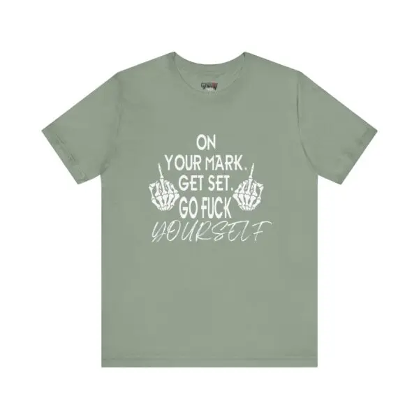 Green t-shirt with bold, offensive text.