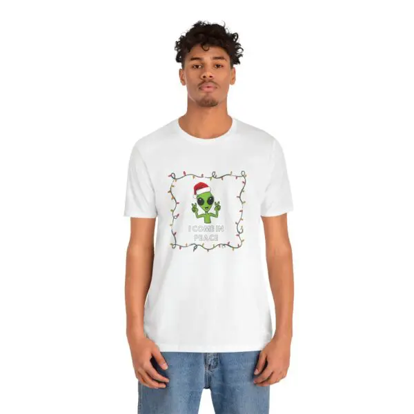 Man wearing festive avocado-themed T-shirt.