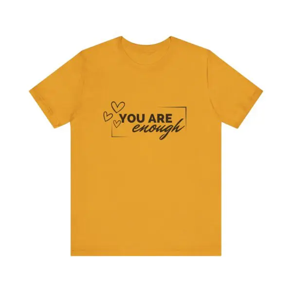 Yellow t-shirt with "You Are Enough" text.