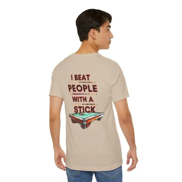Man wearing shirt with humorous text.