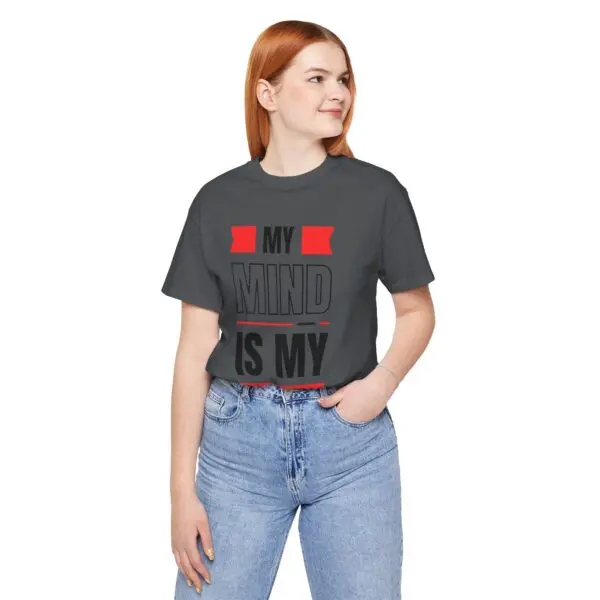 Woman wearing "My Mind Is My" t-shirt.