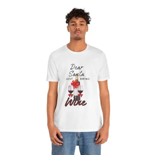 Man wearing "Dear Santa, bring wine" shirt.