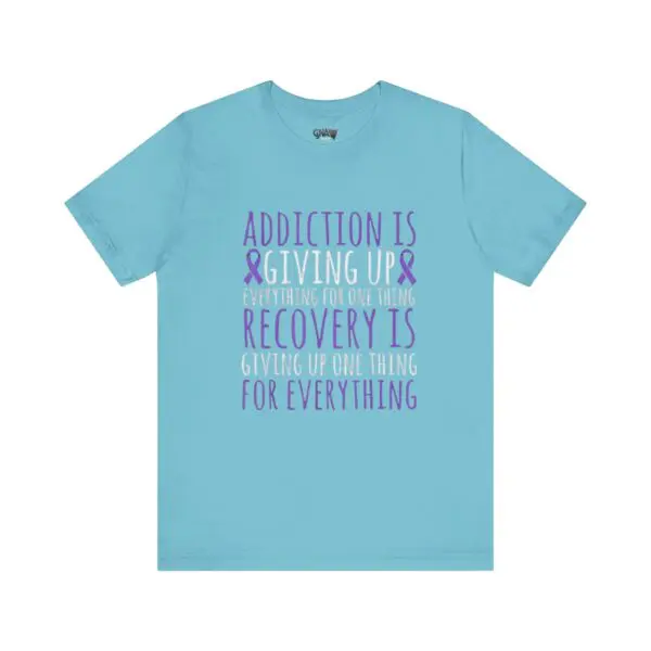 Blue shirt with addiction recovery message.