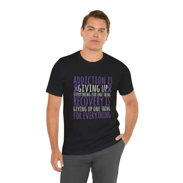 Man wearing addiction recovery message t-shirt.