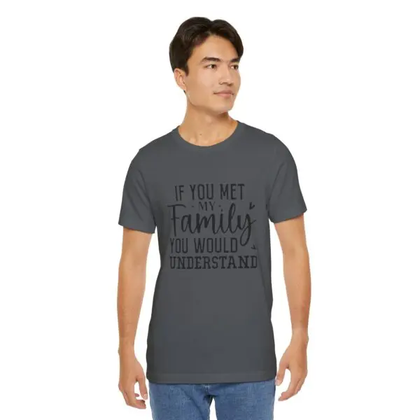 Man wearing humorous family-themed t-shirt.