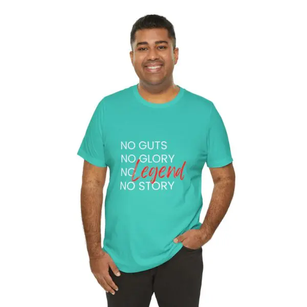 Man wearing motivational graphic teal t-shirt.