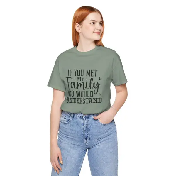 Woman in printed t-shirt and jeans.