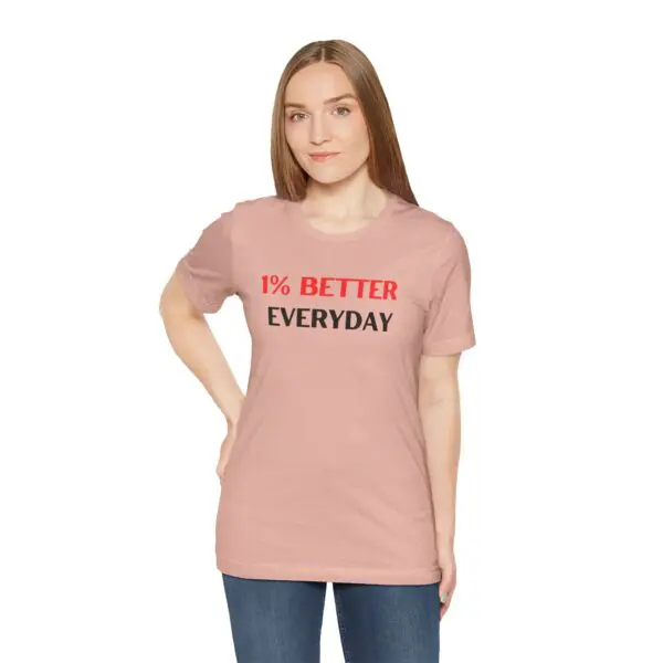 Woman wearing "1% Better Everyday" shirt.