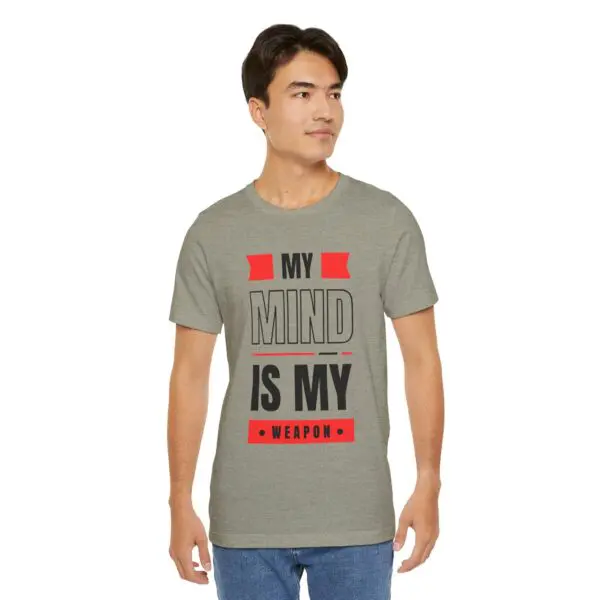 Man wearing "My Mind Is My Weapon" shirt.