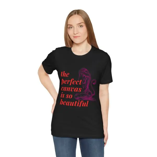 Woman in black t-shirt with red text.
