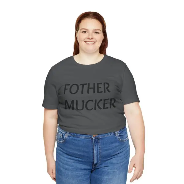 Smiling person wearing "Fother Mucker" t-shirt.