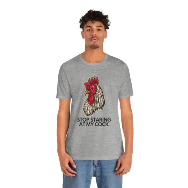 Man wearing rooster-themed humorous t-shirt.