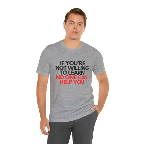 Man wearing motivational quote t-shirt.