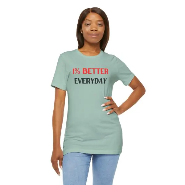 Woman wearing motivational t-shirt, posing confidently.