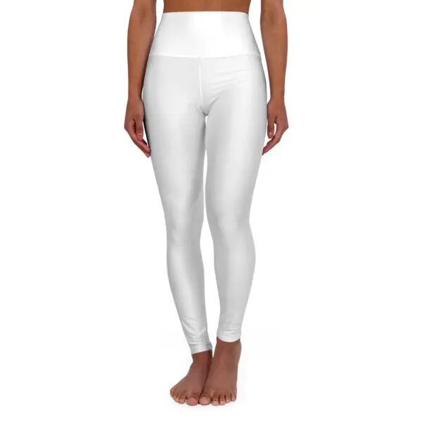 Person wearing white high-waisted leggings.