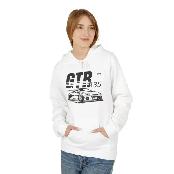 Woman wearing white car-themed hoodie.