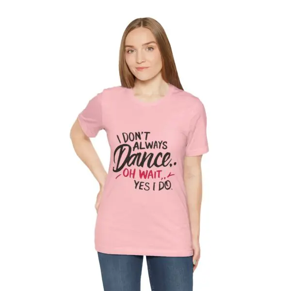 Woman in pink shirt with dance quote.