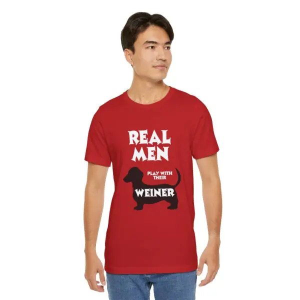 Man wearing red humorous dachshund shirt.