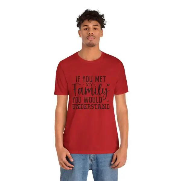 Man wearing red humorous text t-shirt.