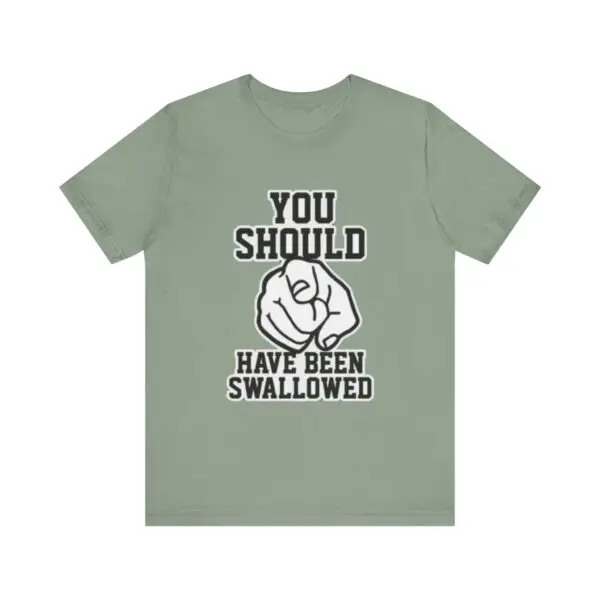 Green shirt with humorous text and fist.