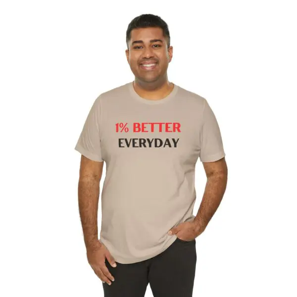Man wearing "1% Better Everyday" t-shirt.