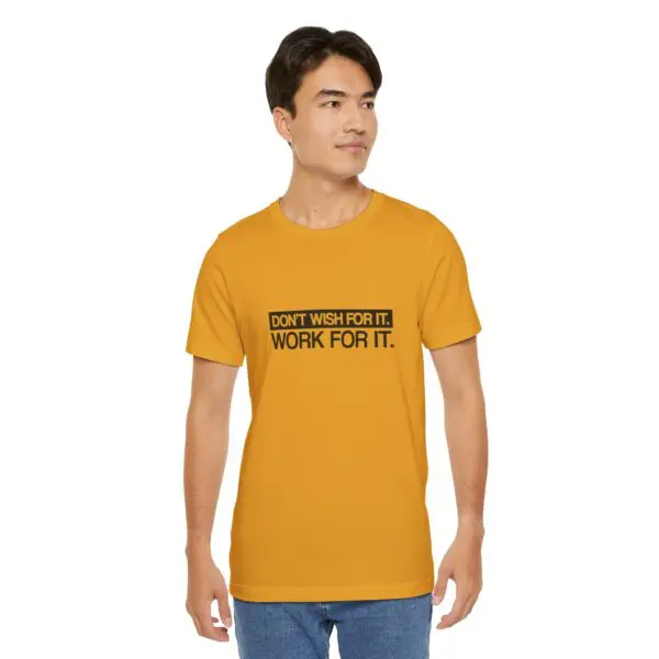 Man wearing motivational quote t-shirt.