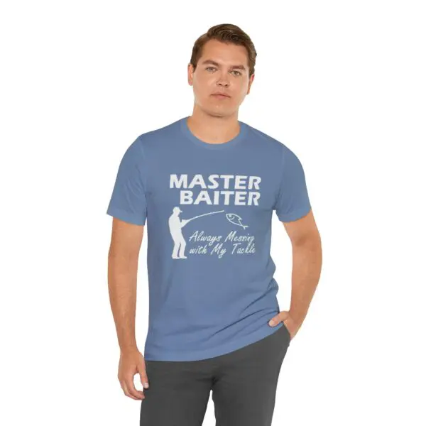 Man wearing blue graphic t-shirt, neutral expression.
