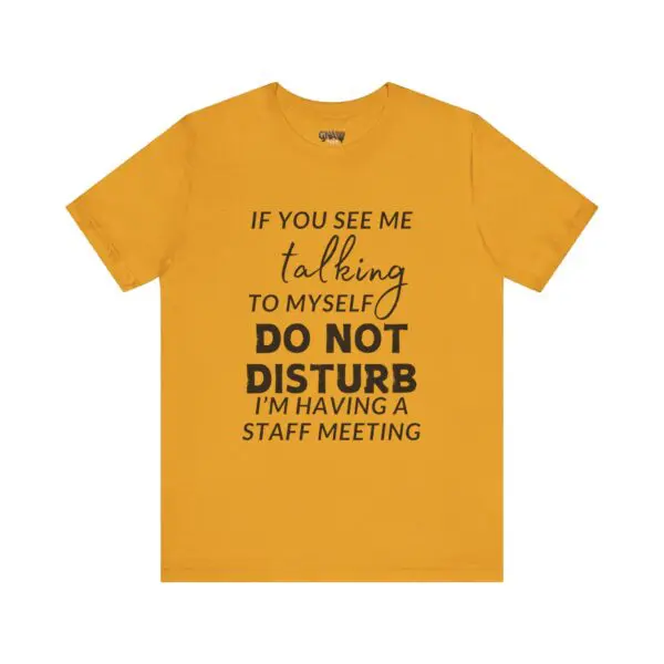 Yellow t-shirt with humorous printed text.