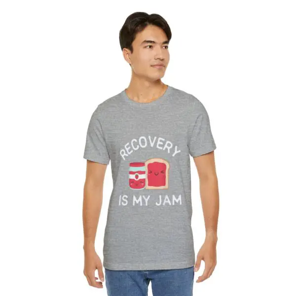 Man wearing "Recovery is My Jam" shirt.