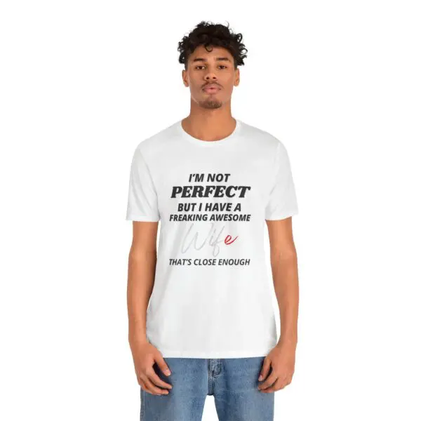 Man wearing a white graphic t-shirt.