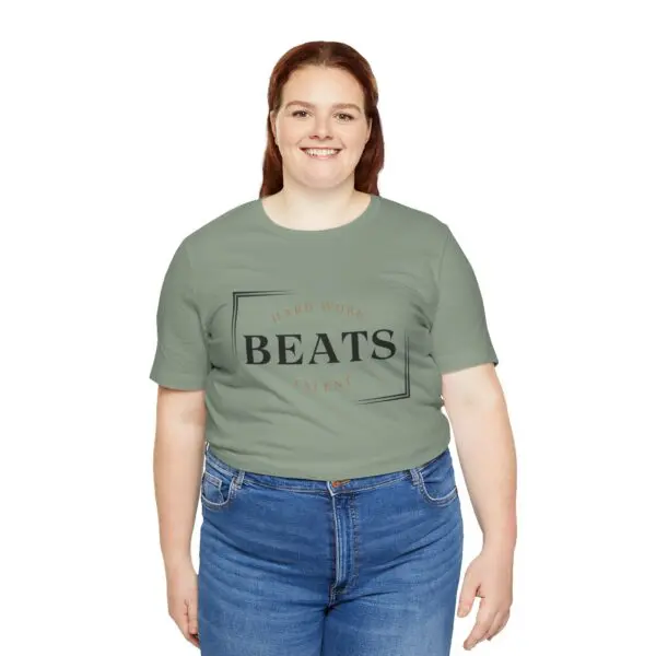 Woman in green shirt and blue jeans.