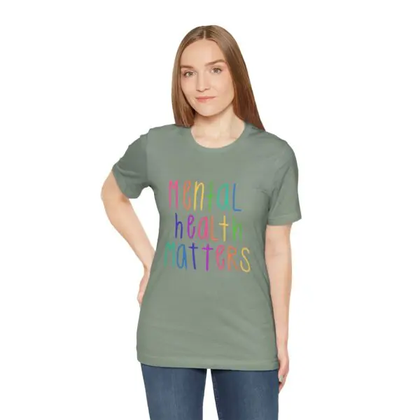 Woman wearing "Mental Health Matters" T-shirt.
