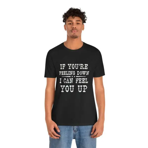 Man wearing black t-shirt with text message.