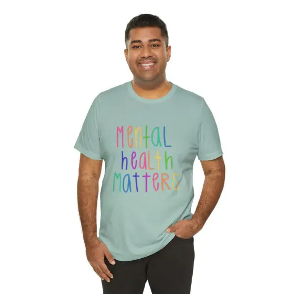 Man wearing "Mental Health Matters" t-shirt.