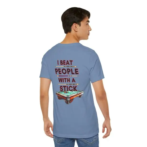 Man wearing shirt with humorous text.