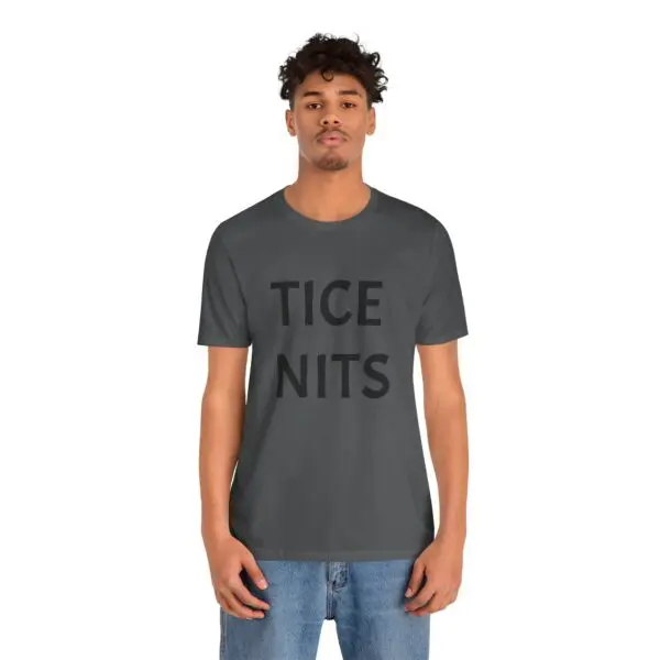 Person wearing gray T-shirt and jeans.
