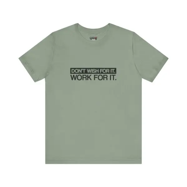 Green t-shirt with motivational quote text.